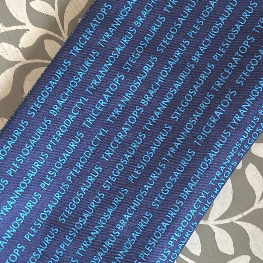 Quilting Fabric Blue Dinosaur Text by Laurie Wisbrun for Robert Kaufman 1/2 Yard